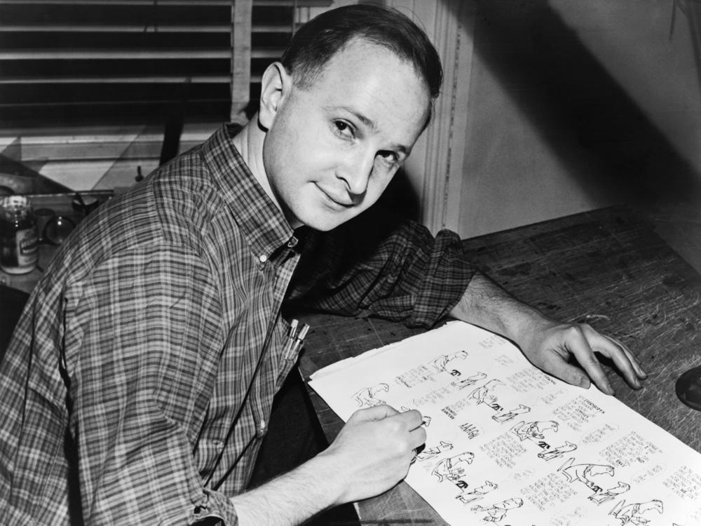 <em>Jules Feiffer at work on proof sheets from his first book,</em> Sick, Sick, Sick <em>in New York in 1958.</em>