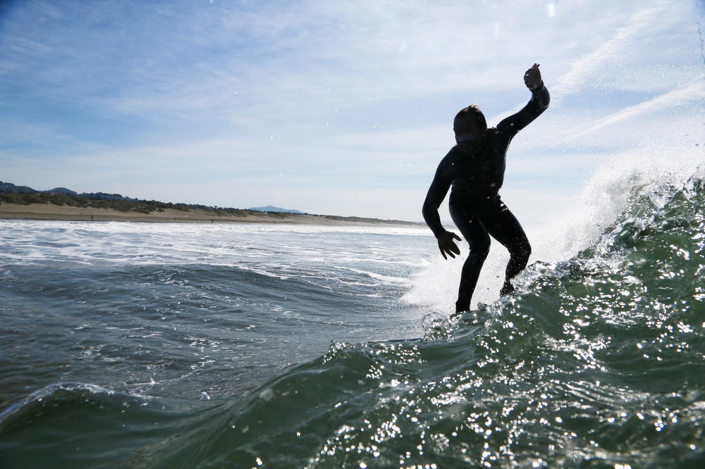 João De Macedo surfs near Ocean Beach.