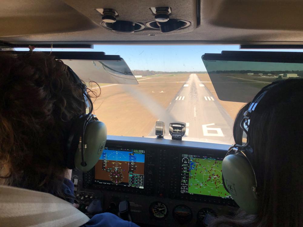 Pilot training is some of the most rigorous of all modes of transportation. Elizabeth White (L) practices landings with instructor Megan Brown at the airport in Auburn, Ala.