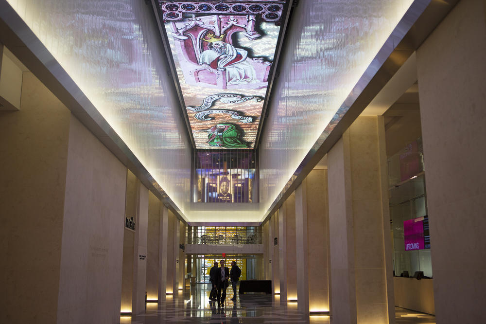 The lobby features a 140-foot digital mosaic that rotates through different images.