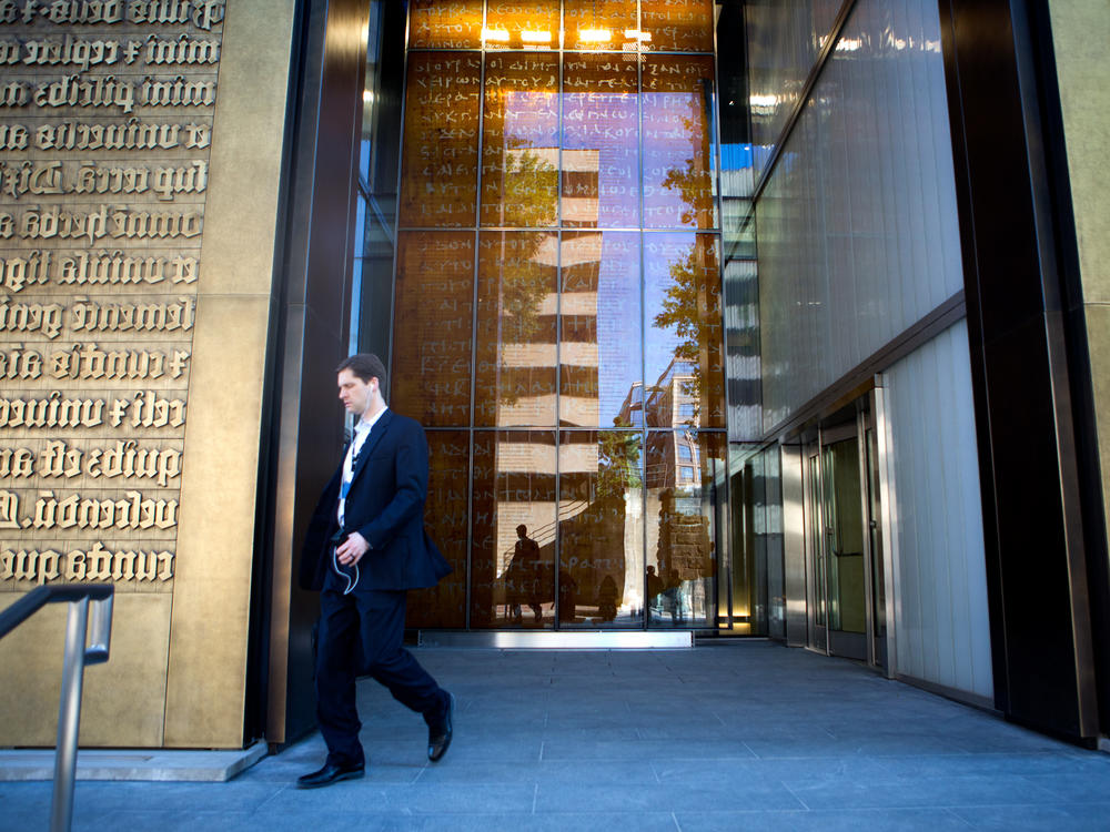 The Museum of the Bible is located near the National Mall in Washington, D.C. The entrance is flanked by large bronze doors depicting the first lines of the Book of Genesis.