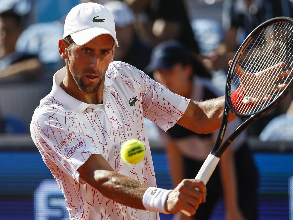 Serbian tennis star Novak Djokovic, 33, says he's not currently showing any symptoms after testing positive for the coronavirus.