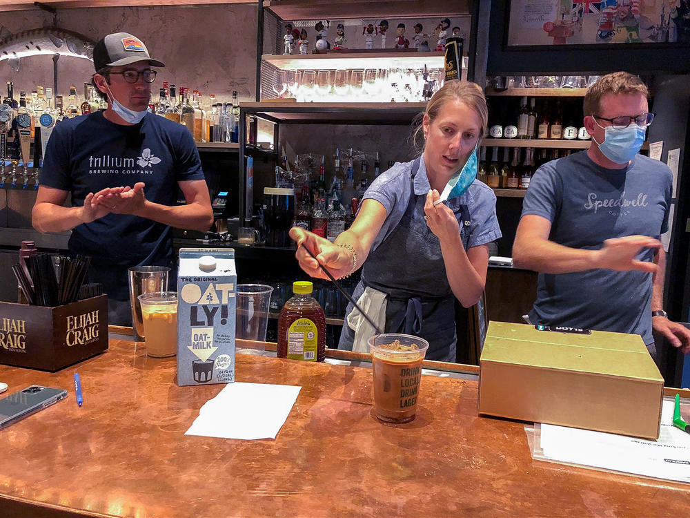 Lauren Moran, a pastry chef who owns a bakery and café, taste-tests Cornwall's new coffee drinks with her husband, Cornwall's general manager Billy Moran (left), and Speedwell Coffee Co. owner Derek Anderson.