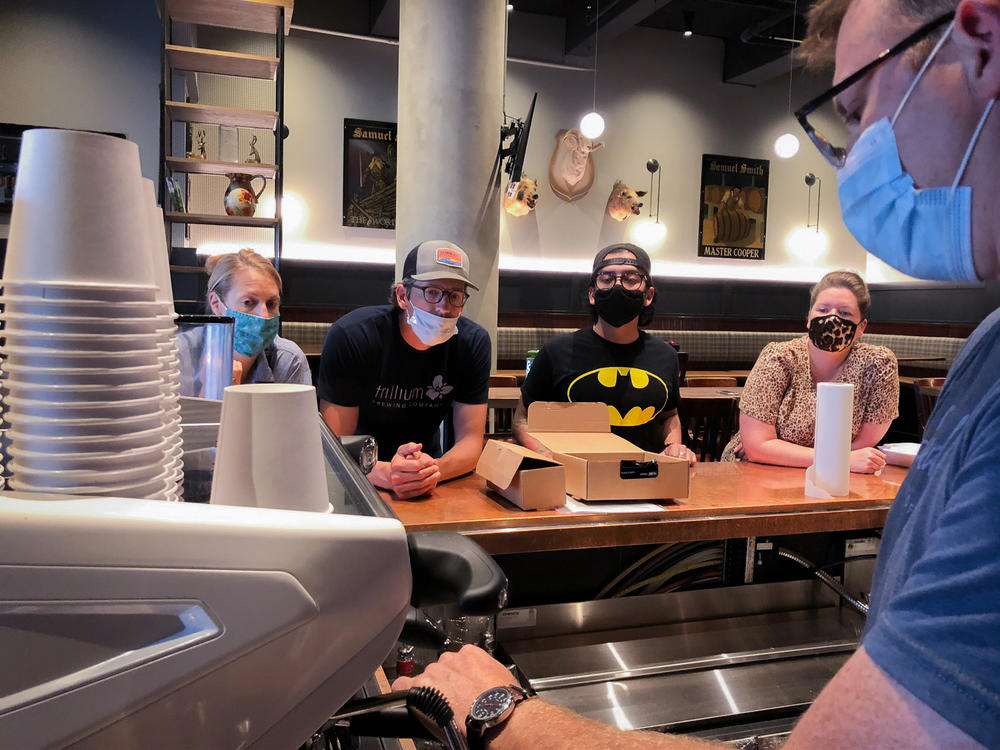 Derek Anderson, owner of Speedwell Coffee Co., offers a crash course on how to use Cornwall's newly installed espresso machine to (from left) Lauren Moran, who's in to help with the new breakfast menu, general manager Billy Moran, server Miz Martinez and waitress Nicole Vincent.