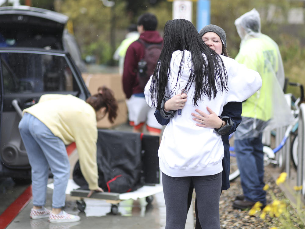Students move out of dormitories at San Diego State University in March, after the university cancelled the rest of the semester and has asked students to move out within 48 hours. Nine percent of young adults say they've moved due to the COVID-19 pandemic.