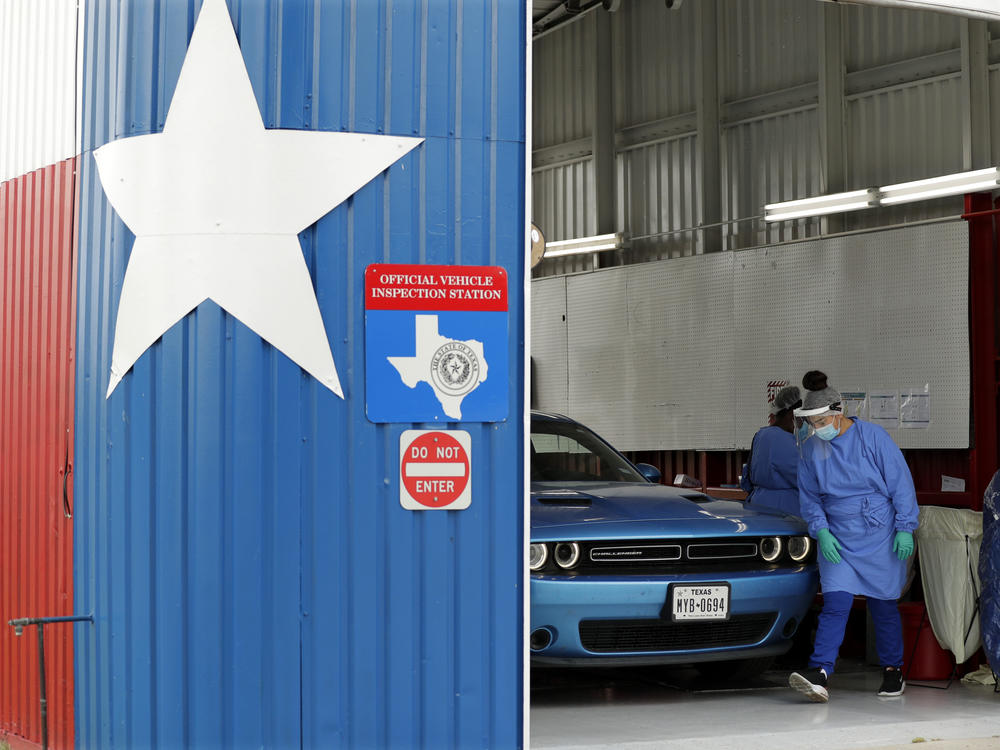 Patients can get COVID-19 diagnostic and antibody tests at a converted vehicle inspection station in San Antonio, as the state reports a record number of hospitalizations and single-day case increases.