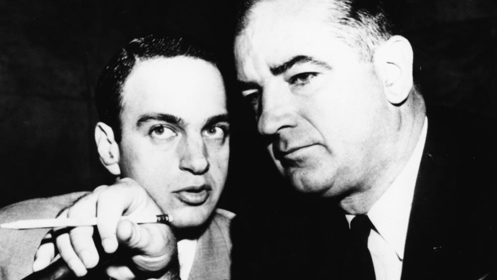 Sen. Joseph McCarthy (right) consults with attorney Roy Cohn, circa 1954. In the 1970s, Cohn would become a mentor and lawyer to Donald Trump.