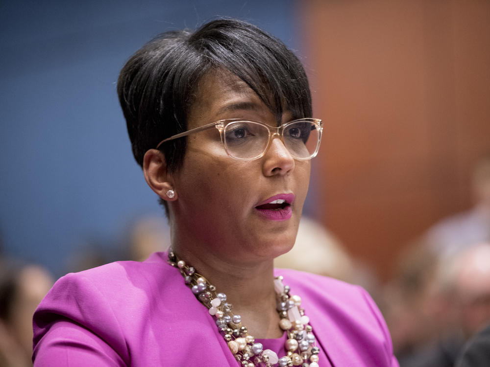 Atlanta Mayor Keisha Lance Bottoms has signed an executive order requiring face coverings in public. She's shown here speaking on Capitol Hill in 2019.