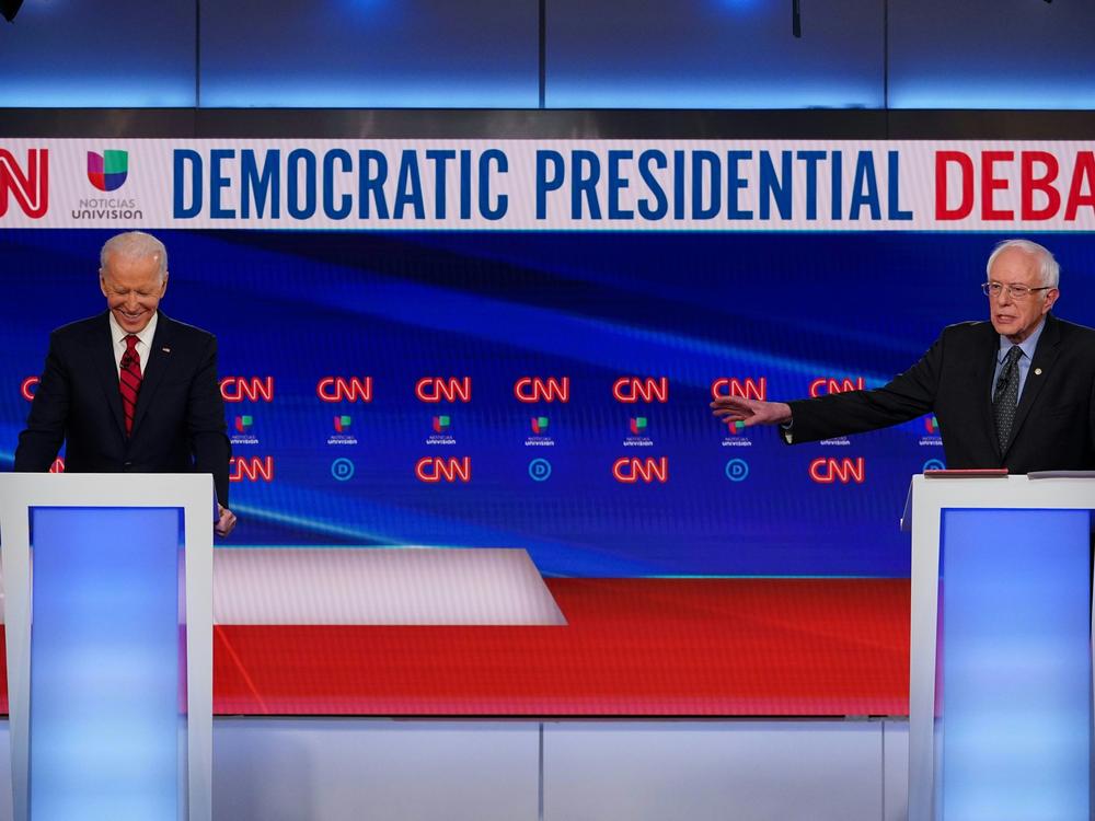 Joe Biden and Bernie Sanders take part in a Democratic primary debate on March 15. After Biden wrapped up the presidential nomination, the two formed joint task forces to formulate policy recommendations on six big issues.