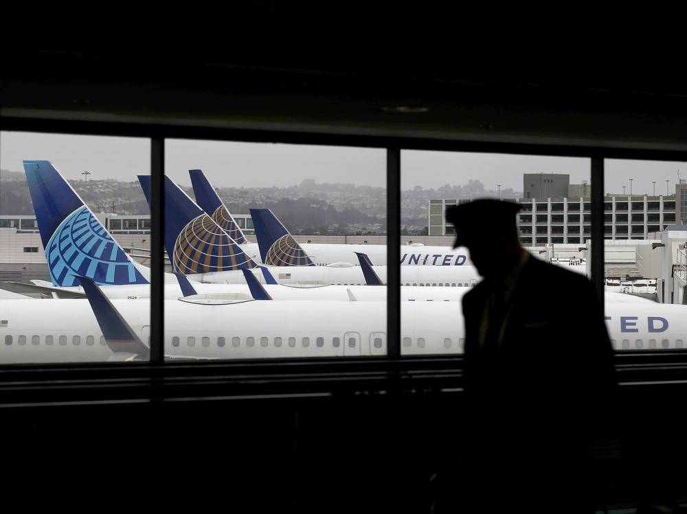 United Airlines says it plans to furlough up to 36,000 employees as the pandemic continues to batter the travel industry and much of the economy.