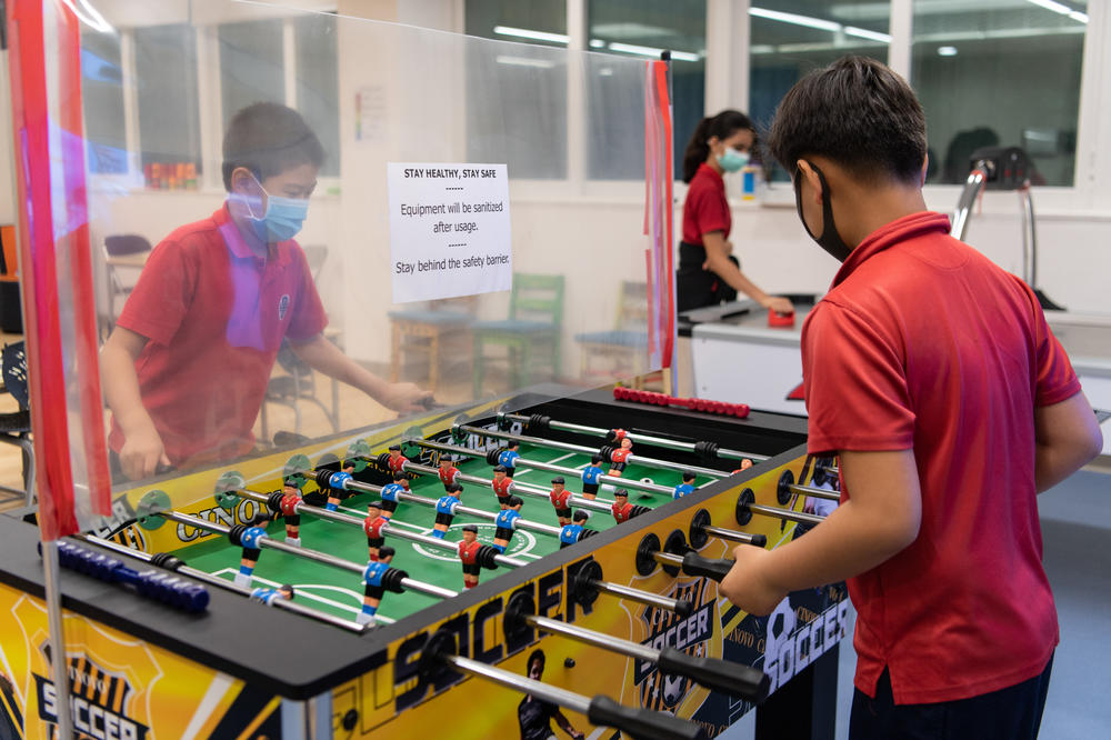 PE during a pandemic could be a game of table football with plastic dividers between players.