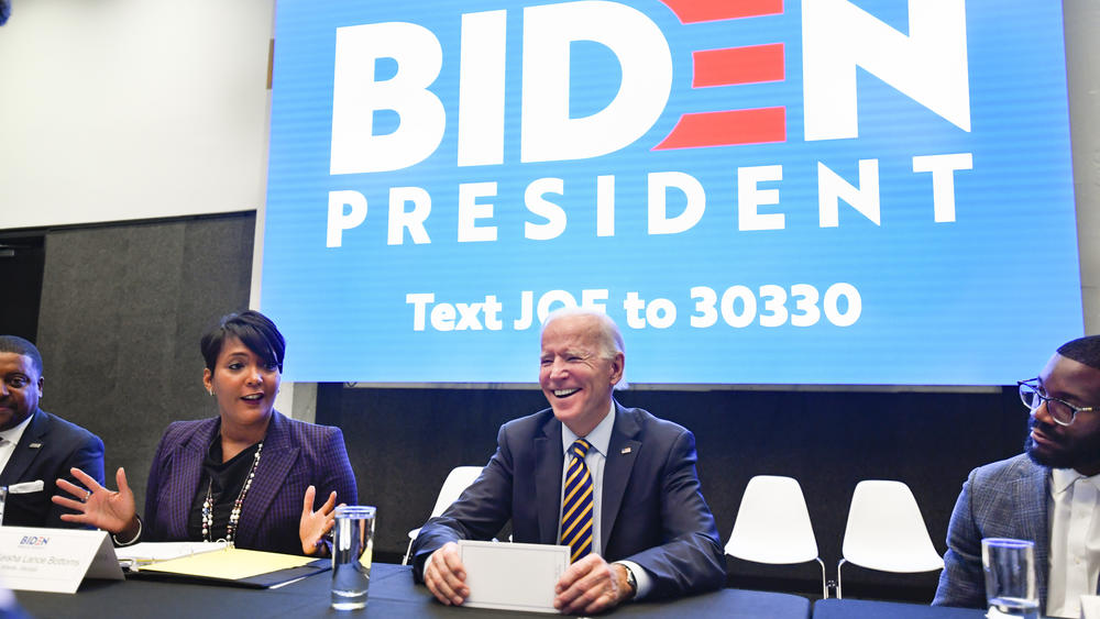 Joe Biden reacts as Bottoms introduces him during an assembly of Black Southern mayors in November in Atlanta.