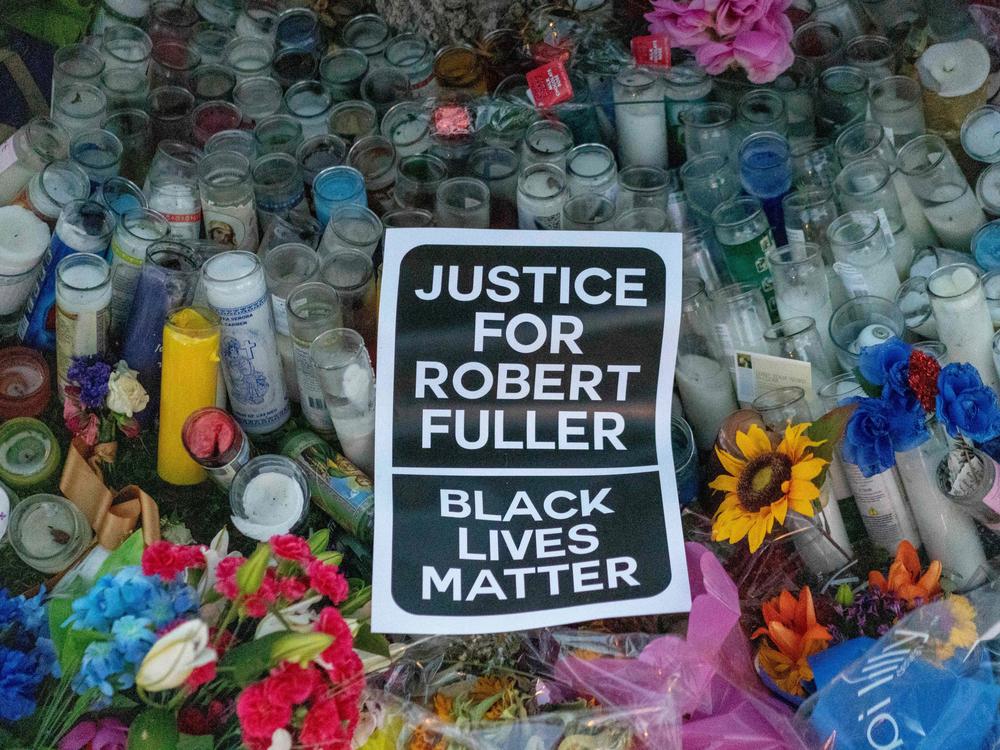 A makeshift memorial is pictured after a Juneteenth demonstration in Palmdale, Calif., at the tree where Robert Fuller was found dead.