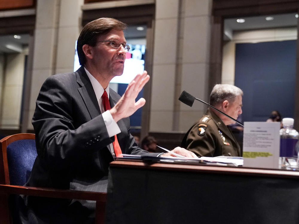 Defense Secretary Mark Esper (left) and Gen. Mark Milley, chairman of the Joint Chiefs of Staff, testify Thursday before a House Armed Services Committee hearing.