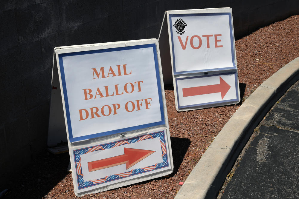 Signs direct people to the entrance of the Clark County Election Department during Nevada's election last month.