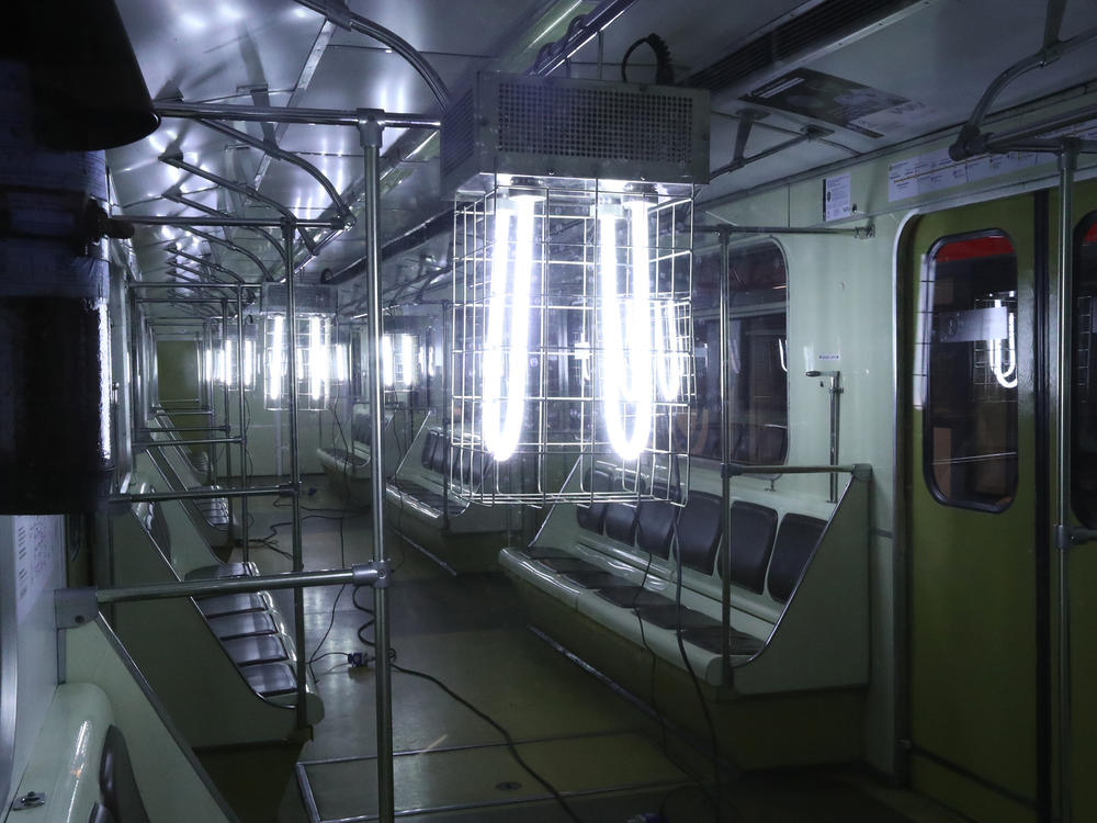 A quartz UV germicidal lamp is used to disinfect a train at the Sviblovo station of the Moscow Metro transit system.