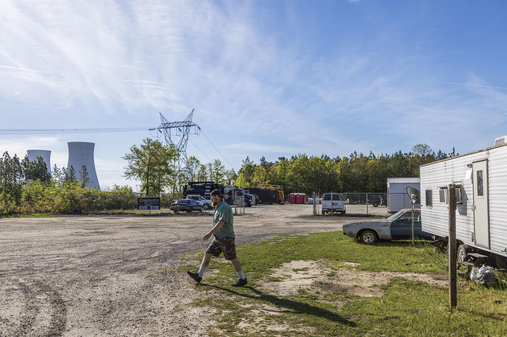 Jonathan Fensamaker walks from his RV to the convenience store where he works across from Plant Vogtle near Waynesboro, Ga. Fensamaker shares his RV park with many of the temporary construction workers at the plant.