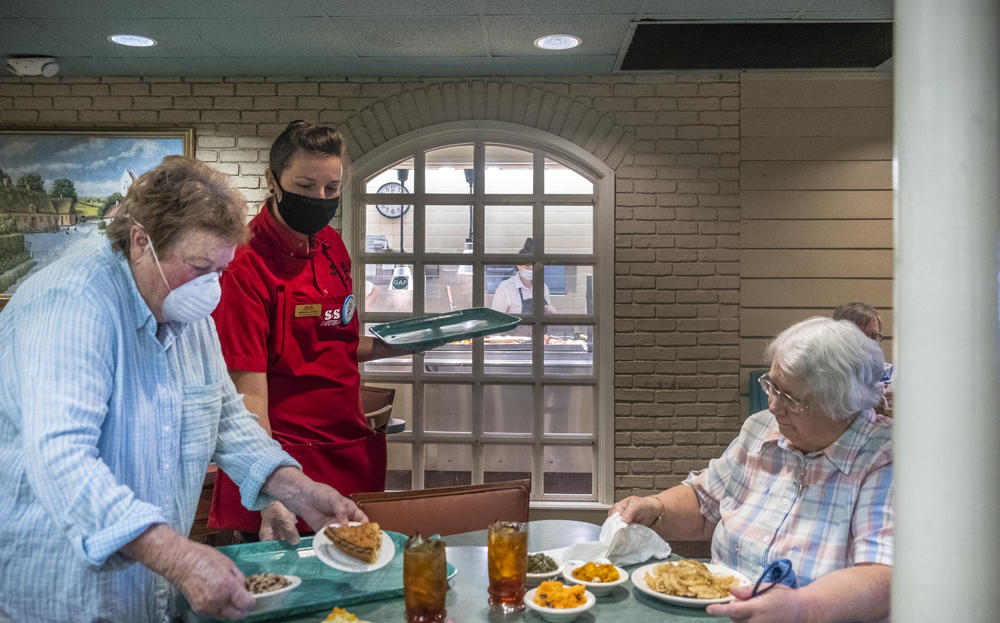 Diners in the S&S Cafeteria in Macon on May 4, 2020. The restaurant thinned its seating capacity by more than half and installed other safety precautions to enable in-house dining after Gov. Brian Kemp eased coronavirus-related restrictions.