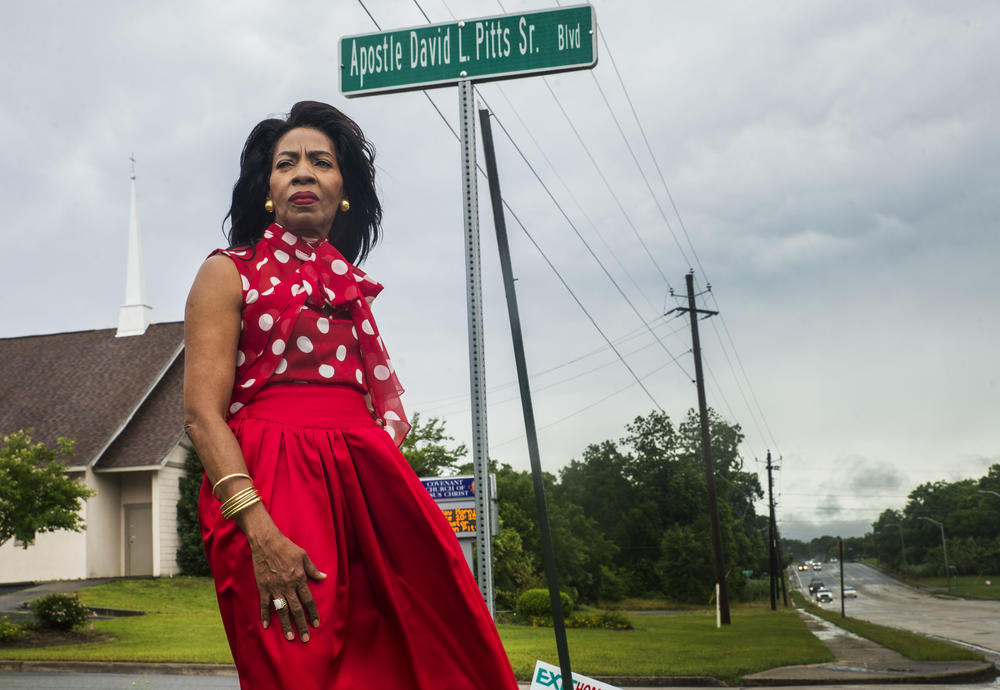Angela Pitts by the street named for her husband of almost 40 years, David L. Pitts, Sr. near Covenant Church of Jesus Christ which he had pastored since the 1970s. Angela Pitts says the street is a monument to the work her husband did in Macon's Unionville neighborhood. It's a monument to her as well. 