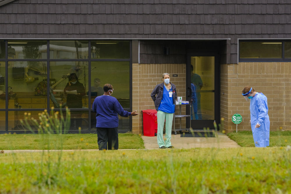Technicians at the Hancock County Health Department, waiting for people to arrive for coronavirus tests. 