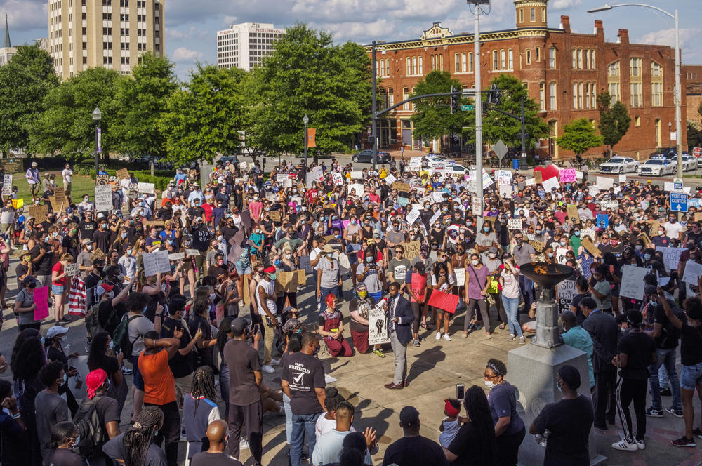 About 800 people marched in protest of police violence in Macon Tuesday. 