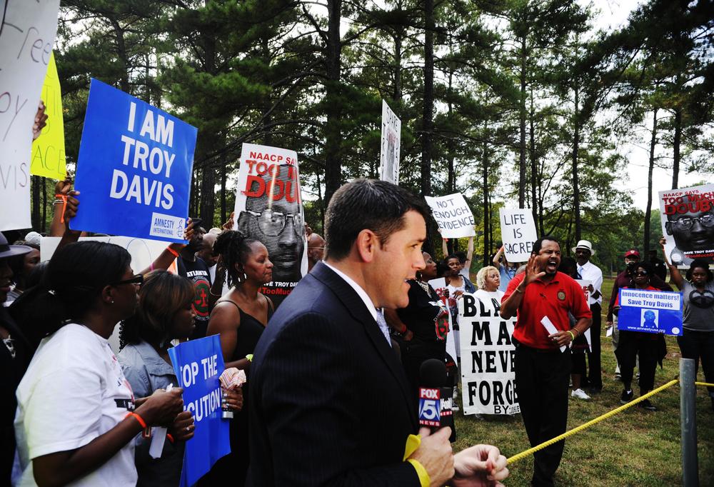 Media members gathered to watch the protest of the impending execution of Troy Davis in 2011.