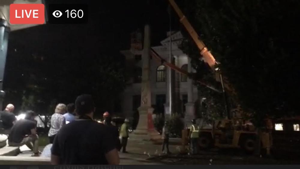 The Confederate monument in downtown Decatur was removed late Thursday.