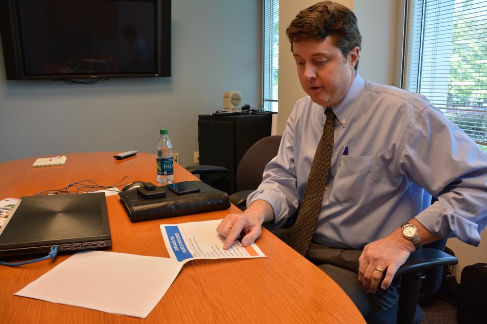 Gwinnett County Department of Transportation Director Alan Chapman discussing funding for transportation improvements. 
