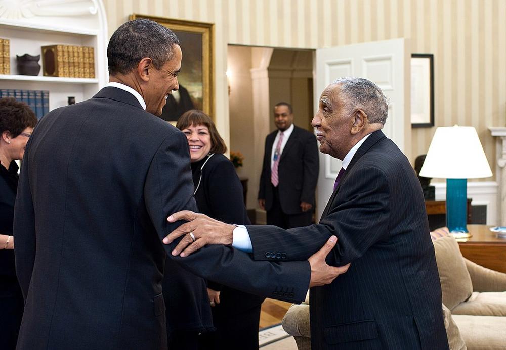 President Barack Obama meets with civil rights movement leader Rev. Dr. Joseph Lowery and his family in the Oval Office, Jan. 18, 2011.