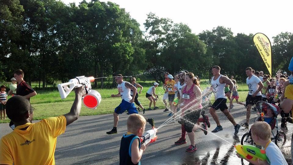 Runners get soaked at the Summer Soaker 5K on Hutchinson Island.