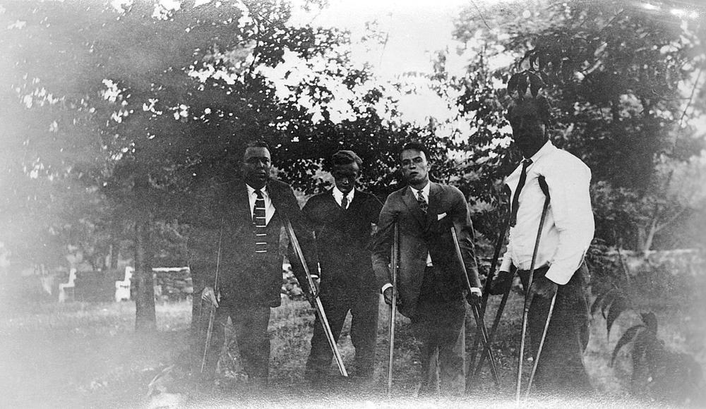 Franklin D. Roosevelt (right) with three other polio patients in Warm Springs, Georgia, in 1925.