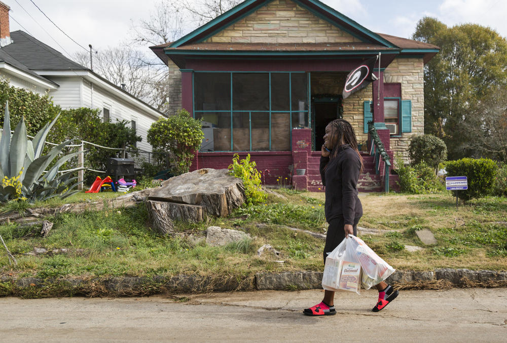 Shakira Stewart carries groceries home from the closest store she can reach on foot. The store carries mostly processed food. But plans for a new 