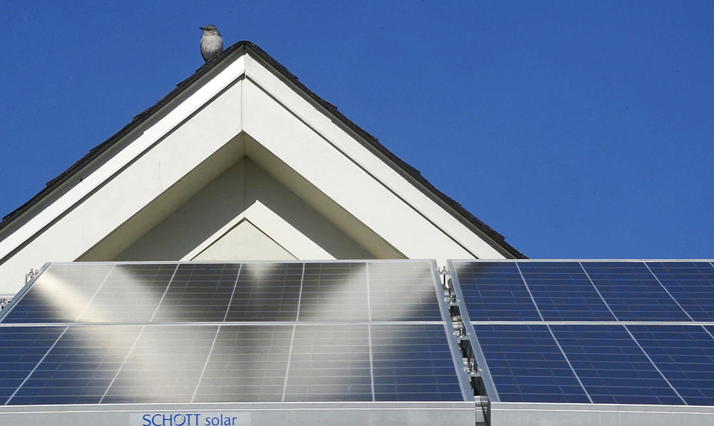 Solar panels on the roof of a home in the Felton Homes public housing complex in Macon in 2014. 