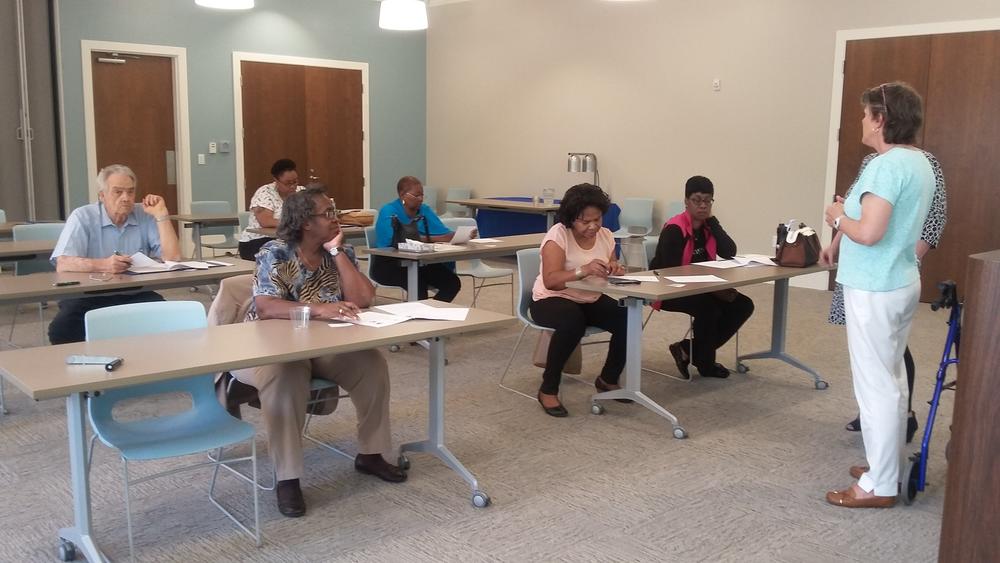Edel Institute instructor Kathleen Schaefer teaches a class on techniques to help with caregiving.
