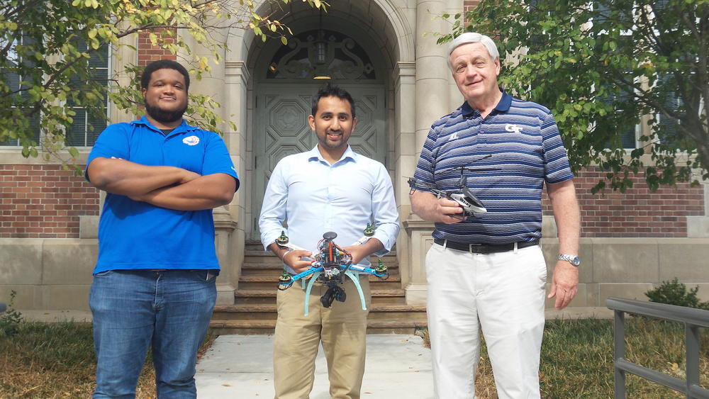 GA Tech graduate students (L to R) Kreston Barron, Srujal Patel, and Dr. Daniel Schrage at the Daniel F. Guggenheim Building for Aerospace Engineering on the GA Tech campus.