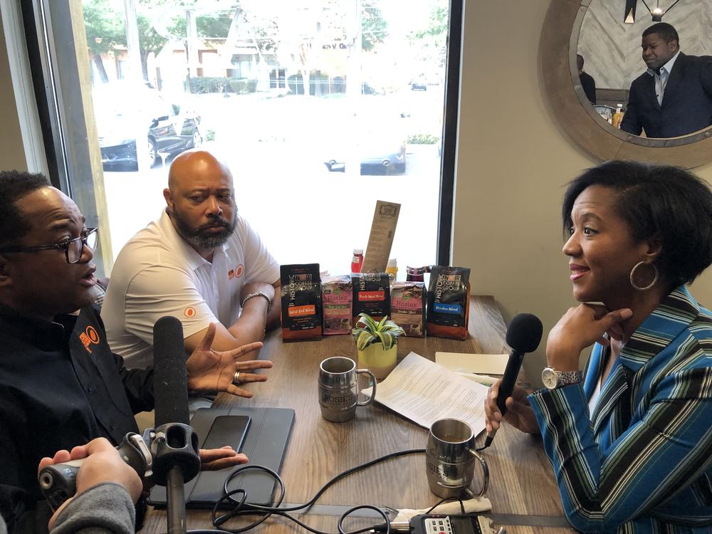 Deron Moreman and Ricardo Richardson speak with GPB's Leah Fleming at Rosie's Coffee Cafe in Atlanta