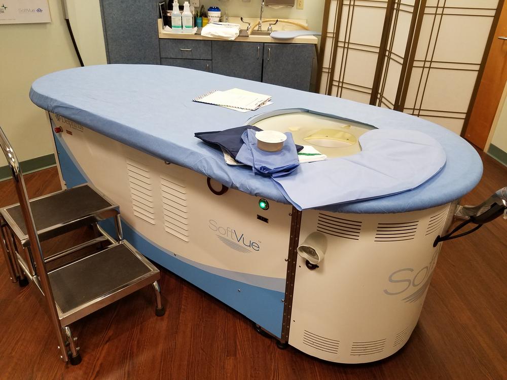 Patients lie on top of the SoftVue for a 3D ultrasound that can show possible cancers that don't show up on a mammogram.