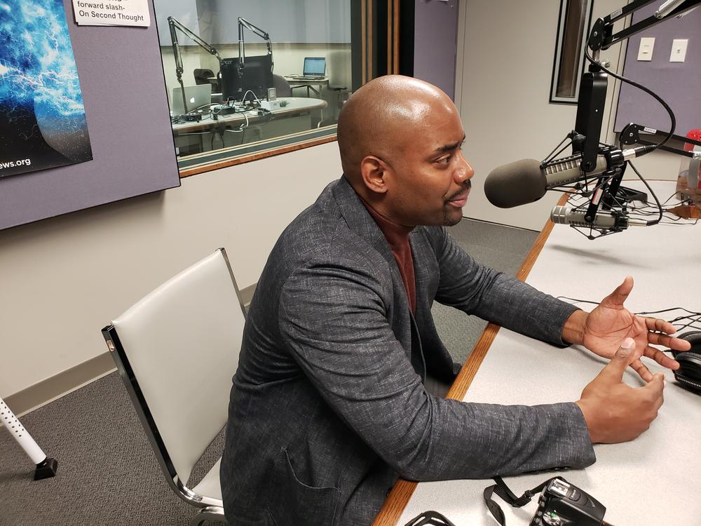 Former Atlanta Falcons player Chris Draft, who now heads up the advocacy group Team Draft, speaks with Leah Fleming ahead of the 'Progress and Promise Against Cancer' event at Morehouse