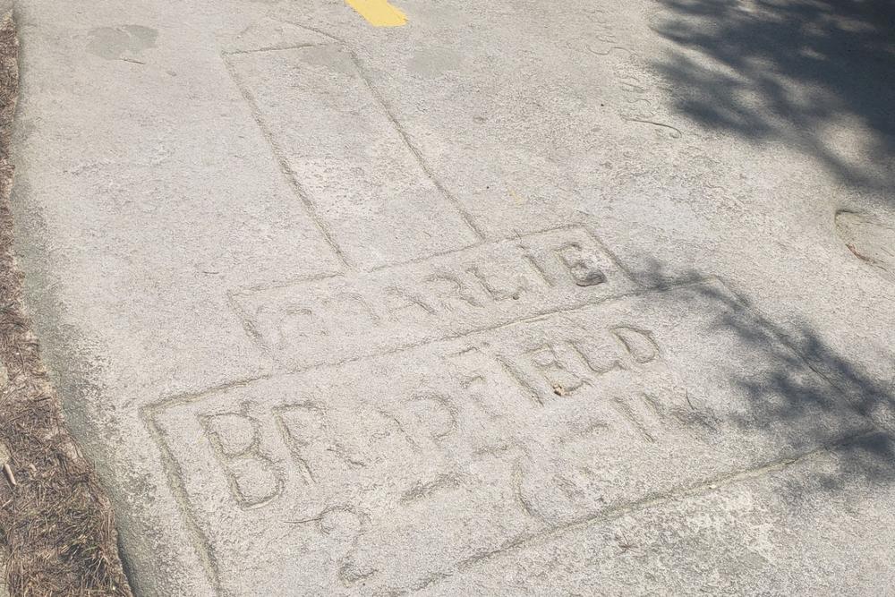 This carving from the early 20th century is among the hundreds that dot the trail up Stone Mountain.