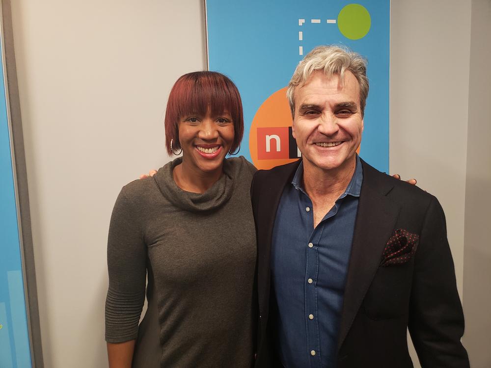 GPB Morning Edition host Leah Fleming (left) speaks with writer Tom Junod (right), who befriended Fred Rogers after profiling him for Esquire in 1998.