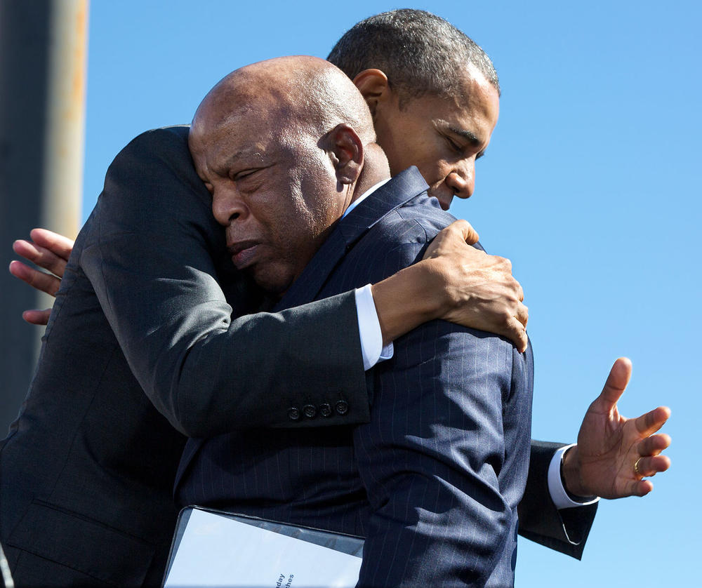 President Barack Obama hugs Rep. John Lewis, D-Ga., after his introduction during the event to commemorate the 50th Anniversary of Bloody Sunday and the Selma to Montgomery civil rights marches, at the Edmund Pettus Bridge in Selma, Ala., March 7, 2015.