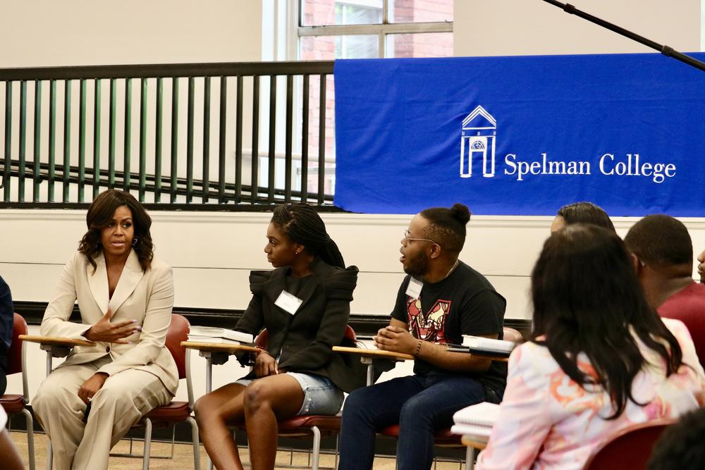 Former First Lady Michelle Obama shares stories with students from Spelman and Morehouse who studied her autobiography during the semester. 