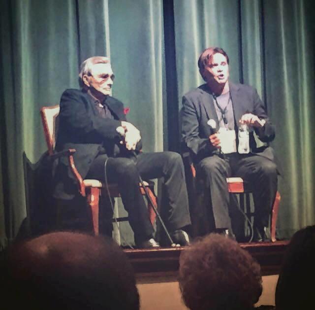 Terrell Sandefur (r) during a Macon Film Festival panel with actor Burt Reynolds in 2015.