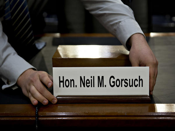 The name placard for Neil Gorsuch, U.S. Supreme Court nominee, is placed on a witness table before a Senate Judiciary Committee confirmation for Gorsuch on Monday.
