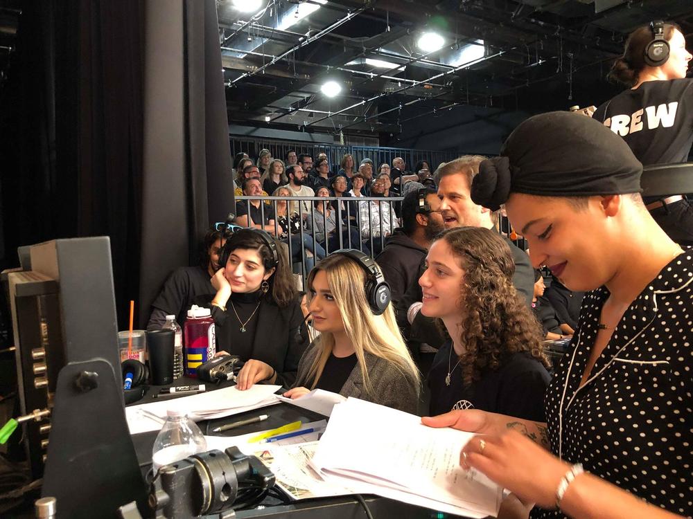 SCAD student Cori Graves (right) follows the taping of G.R.I.T.S. with her fellow crew members. Watching on with them is DW Moffett, who chairs the film and television department.
