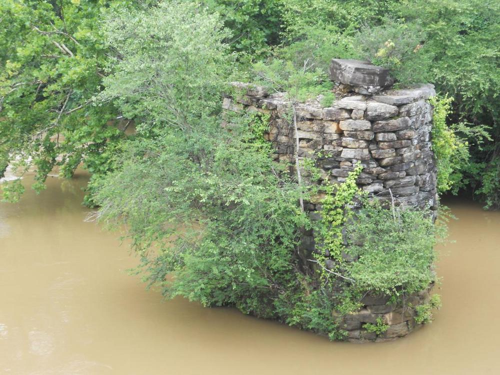 The last remaining column from the original bridge along Holcomb Bridge Road.