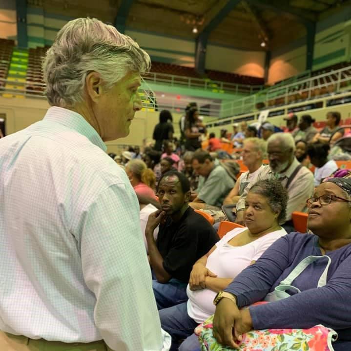 Savannah Mayor Eddie Deloach (left) speaks with residents during storm preparation for Hurricane Dorian