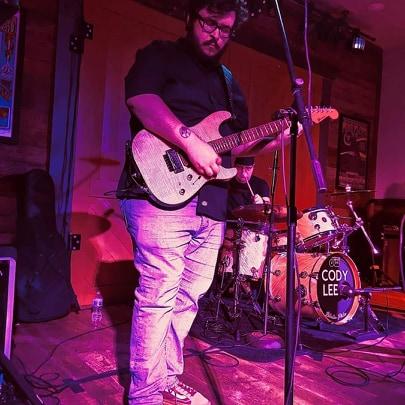 Tyler Cardinal is a private music instructor who has felt the financial impact of coronavirus in the past week.