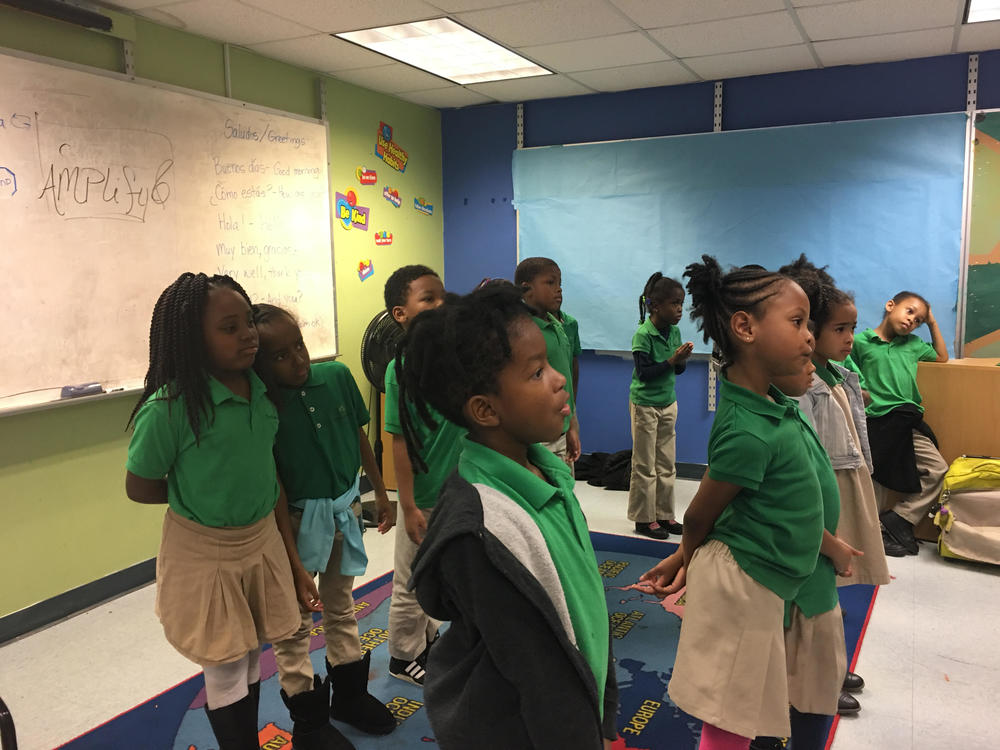 Children in the Atlanta Music Project prepare to sing.