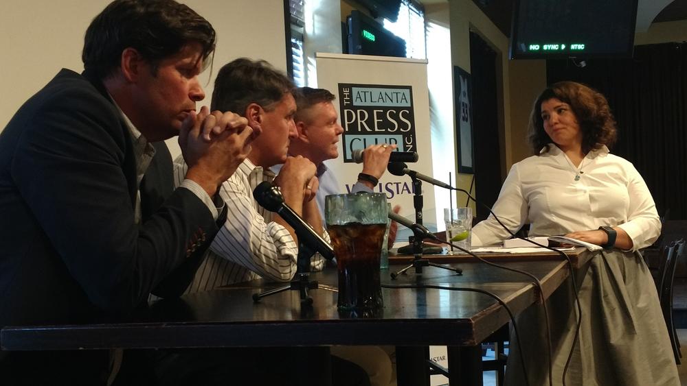 As part of an Atlanta Press Club panel discussion, On Second Thought host Celeste Headlee talked with (l to r) Richard Fausset of The New York Times, Cam McWhirter of The Wall Street Journal, and Martin Savidge of CNN.